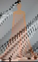 strapless evening gown with structured corset back and flowing skirt