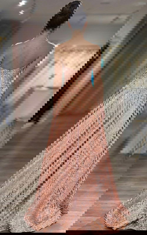 strapless formal gown highlighting structured bodice and flowing skirt volume