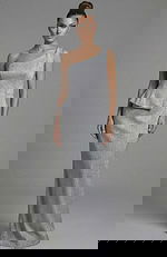 One shoulder fitted evening gown with sculpted waist and subtle peplum