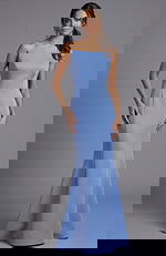 Strapless fitted gown with a straight sharp-corner neckline and clean mermaid silhouette on a fashion model