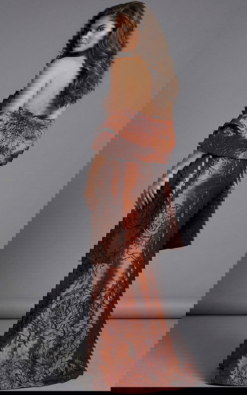 Back view of strapless brocade gown with bow detail and long skirt