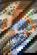 Asymmetrical sequin prom dress featuring radiant blue and silver pattern