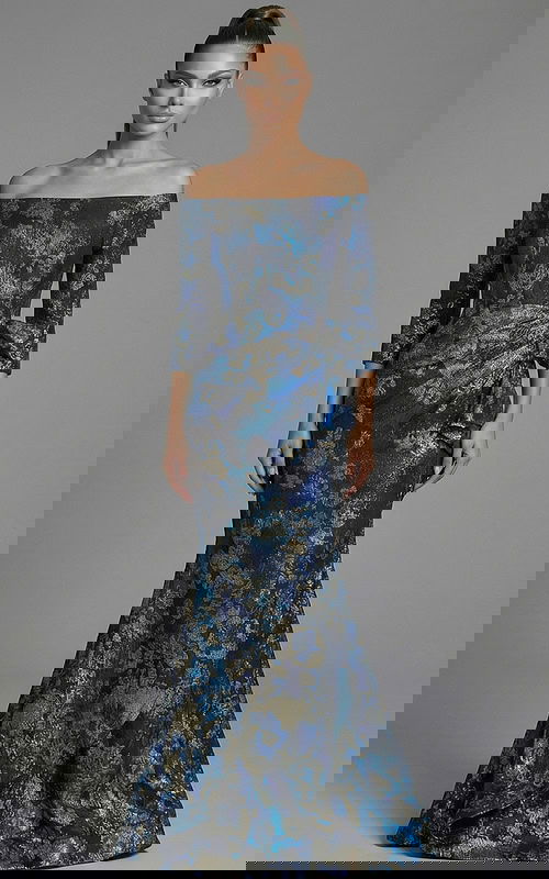 f shoulder brocade gown with draped waist and fitted silhouette