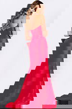 Elegant red gown with structured bodice and slit skirt