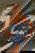 Embellished gown with shimmering sequins and front slit detail