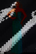 Strapless aqua beaded prom dress with deep sweetheart neckline and crystal embellishments