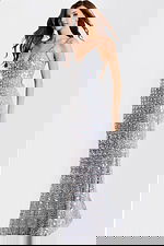 Glamorous sheath gown featuring spaghetti straps and sequins