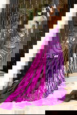 Sparkly purple sequin gown featuring open back and long train