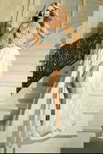 Elegant white gown with sweetheart neckline and beaded top detail