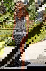 Floor length gown with intricate beading and smooth back silhouette