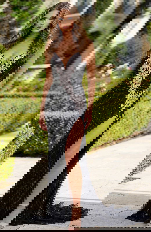 Floor length gown with intricate beading and smooth back silhouette