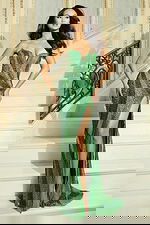 Model wearing strapless beaded gown with sweetheart neckline and high slit