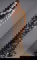 Floor length velvet gown with floral brocade fabric and clean straight silhouette