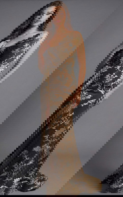 Floor length velvet gown with floral brocade fabric and clean straight silhouette