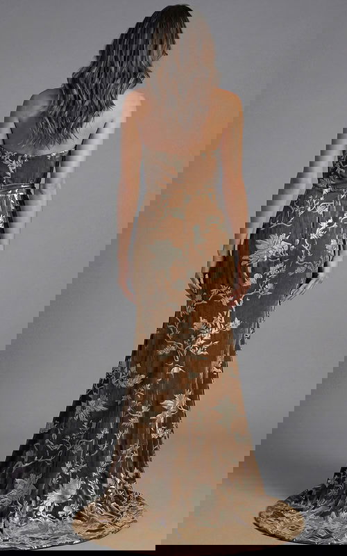 Back view of strapless velvet evening gown with floral brocade detailing and fitted silhouette