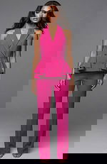 Halter vest style top with peplum detail and tailored pants front view