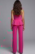 Back view of structured vest top with peplum and straight leg pants