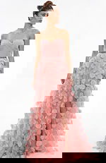 Front view of strapless gown with sweetheart neckline, gathered bodice, and textured appliqué skirt with front slit