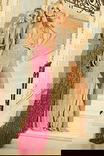 Beaded sheer panel gown styled for an elegant formal look