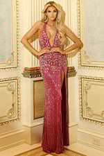 Models in glamorous evening gowns with sequin detailing and fitted silhouettes