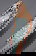 Close up front view of a strapless lace gown with floral detailing and fitted bodice