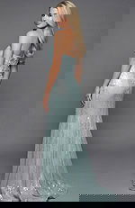 Back view of a strapless lace column gown with smooth fitted silhouette and flowing hem