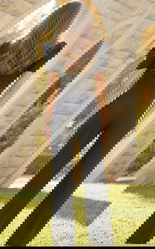 Structured formal jumpsuit with fitted waist and clean straight leg design