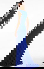 Back view of a fitted gown with clean lines and flowing floor length finish