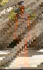 Strapless fitted gown with intricate beading, sculpted bodice, and thigh high slit in a sleek silhouette