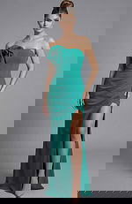 Strapless fitted evening gown with sculpted bodice, thigh high slit, and floral accent