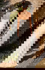 Back view of strapless lace wedding gown with smooth fitted finish