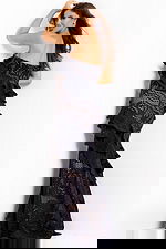 Elegant fitted gown featuring cascading ruffles