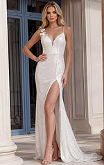 Front view of a radiant white sequined prom dress showing a deep neckline with a sheer horizontal support strap and floral shoulder embellishments.