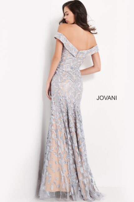 back view of model wearing Jovani 49634 in light blue with intricate lace detailing