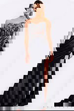 Elegant black prom dress with ruched waist and thigh-high slit