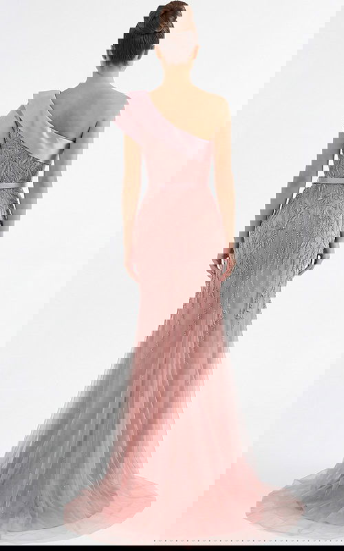 Back view of one shoulder beaded evening gown with sheer tulle train