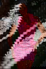 Textured halter mini dress with rosette details