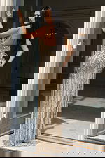 Back view of beaded gown with low back and detailed beadwork