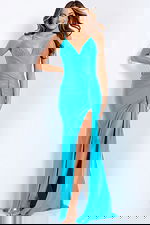 Sleek V-neck gown with ruched bodice and high slit detail.