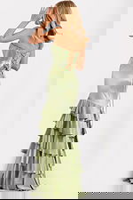 Strapless satin gown with tiered ruffle skirt