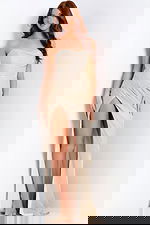 Back view of strapless fitted gown with flowing train.