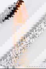 Elegant beaded gown with high slit and open back