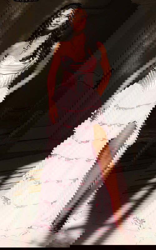 Strapless tiered gown with satin corset bodice and high slit