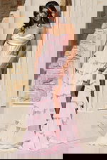 Elegant lace-up back gown with cascading ruffle skirt