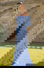 Off shoulder gown with draped wrap bodice and fitted silhouette