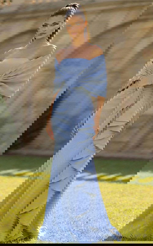 Off shoulder gown with draped wrap bodice and fitted silhouette