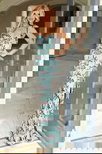 Floral beaded prom dress with thigh-high slit and spaghetti straps