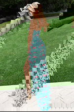 Elegant beaded floral dress with open back and fitted silhouette