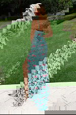 Romantic floral prom dress with intricate beadwork and long skirt