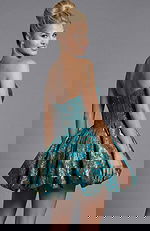 Fitted strapless evening dress in textured brocade with voluminous hem